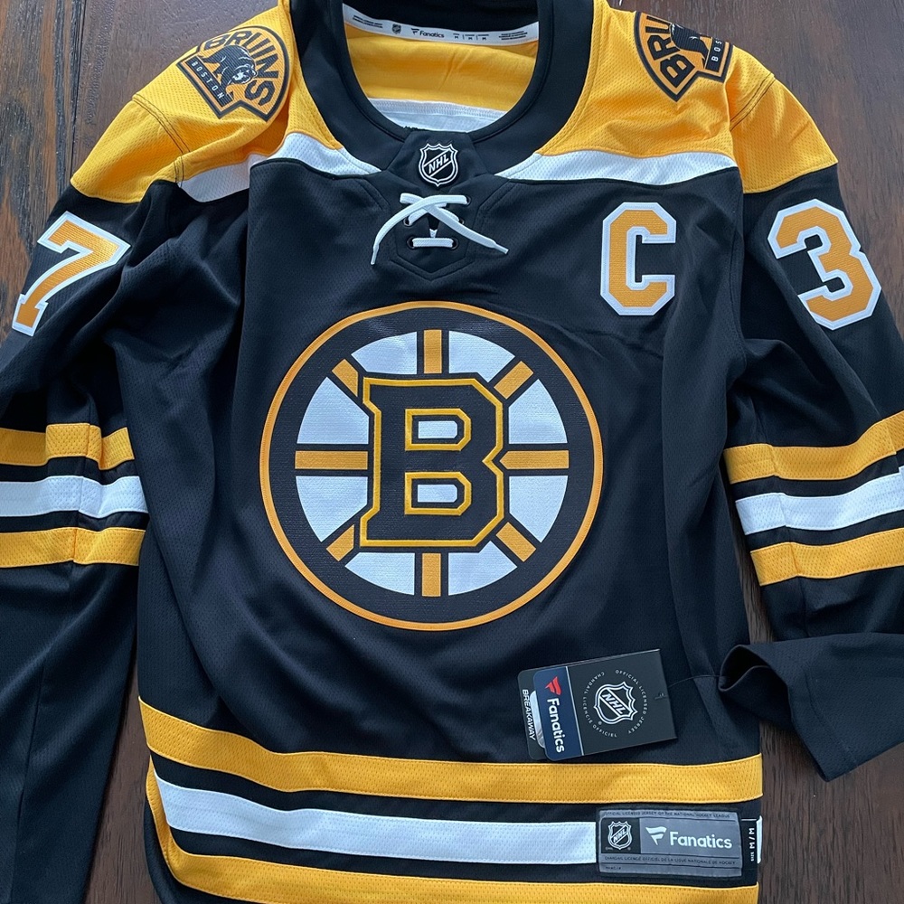 Bruins NHL Patrice Bergeron jersey, size Medium. Never worn.
